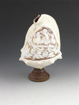 Appraisal: An Italian carved cameo conch shell decorated musical maidens the