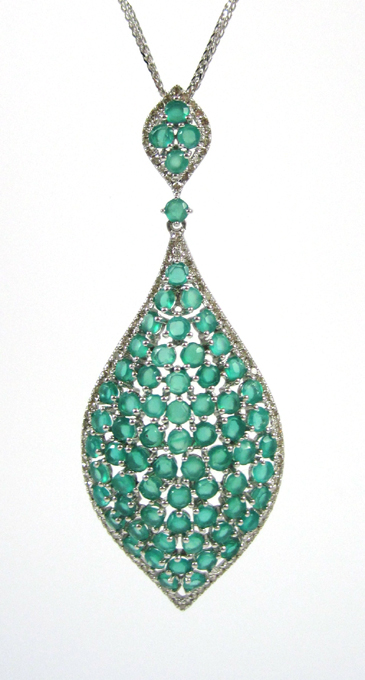 Appraisal: EMERALD AND DIAMOND PENDANT NECKLACE with an inch k white