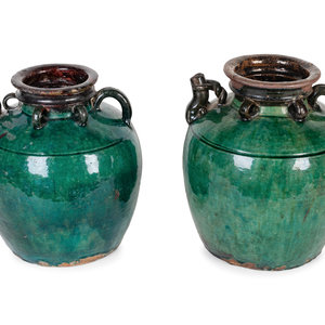 Appraisal: A Near Pair of French Dark Green Glazed Pottery Gargoulette