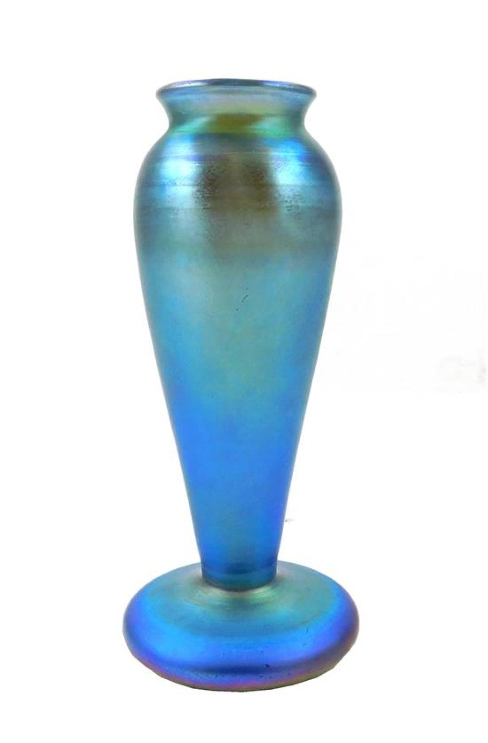 Appraisal: Quezal Iridescent Blue Vase slightly tapered neck over elongated baluster