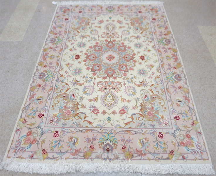 Appraisal: A CONTEMPORARY PERSIAN WOOL AND SILK AREA RUG floral and