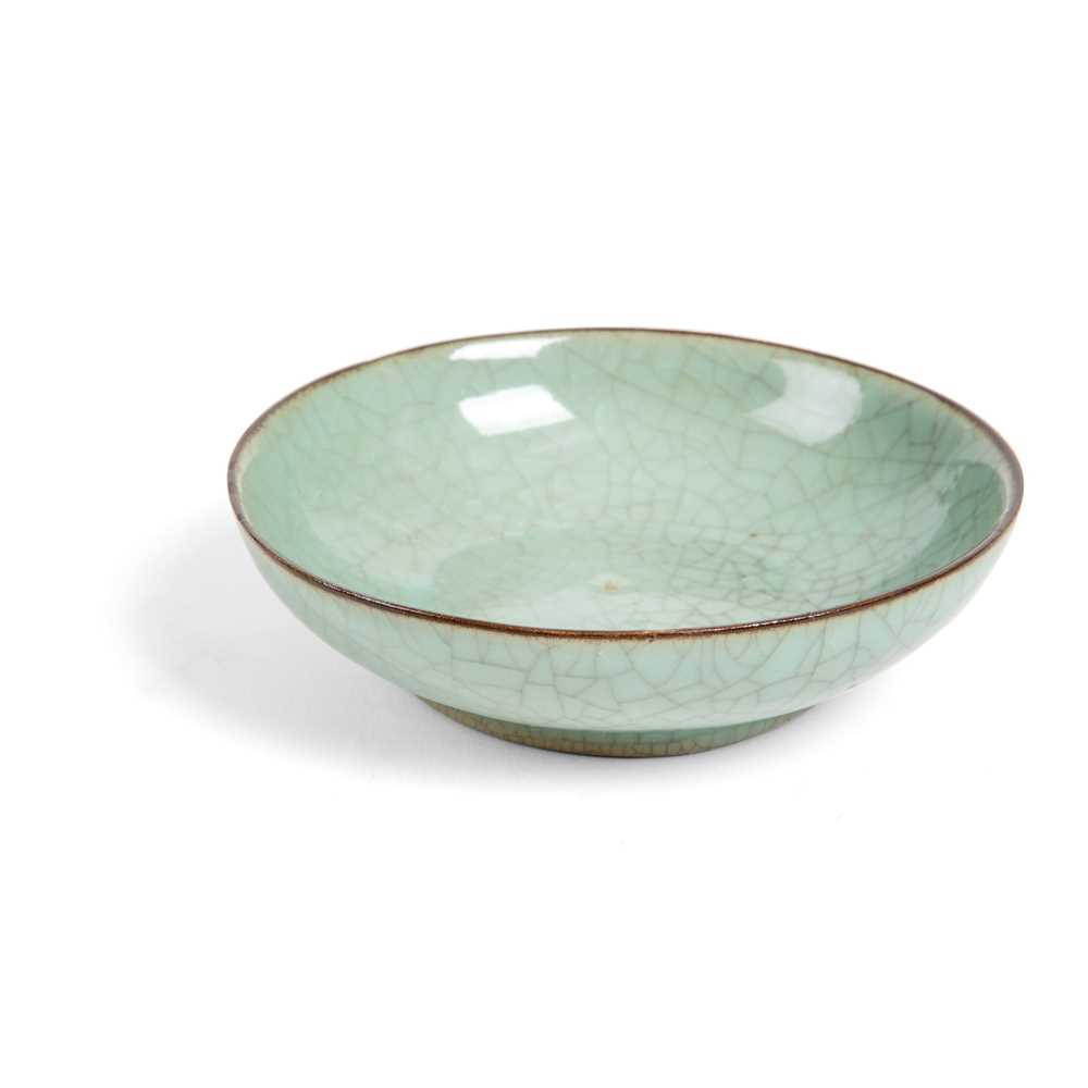 Appraisal: CELADON DISH covered overall save for the three minuscule prong