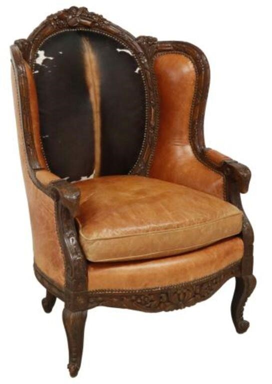 Appraisal: Large wingback armchair th c carved lyre and foliate crest