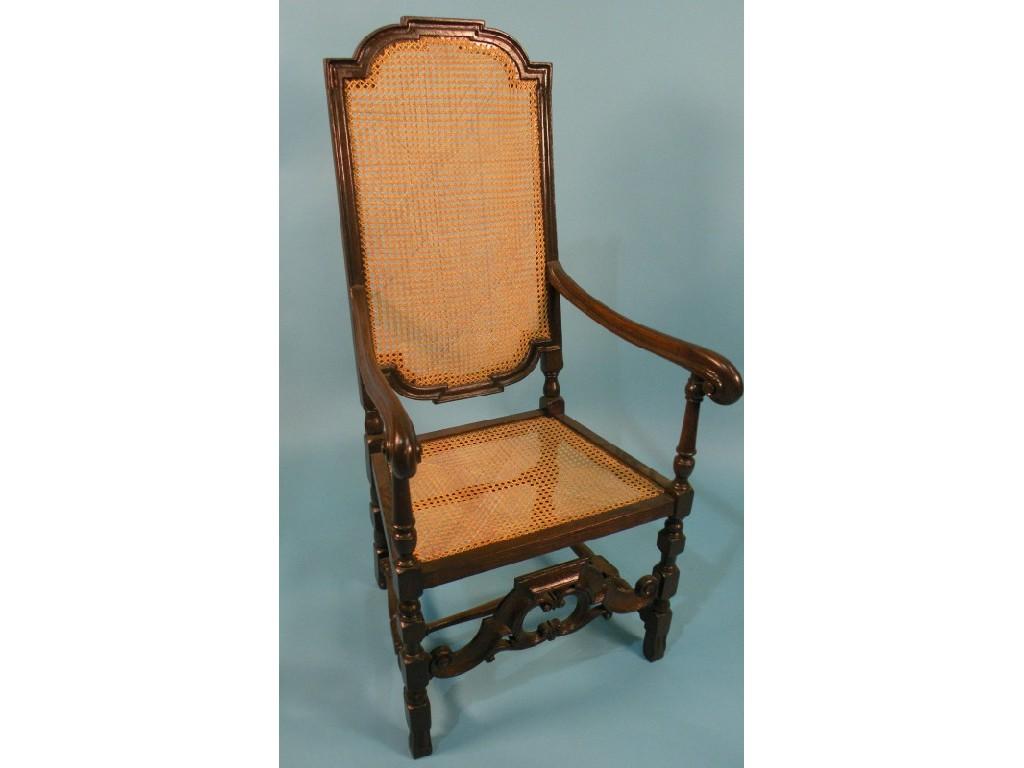 Appraisal: An oak open armchair in late thC style with a