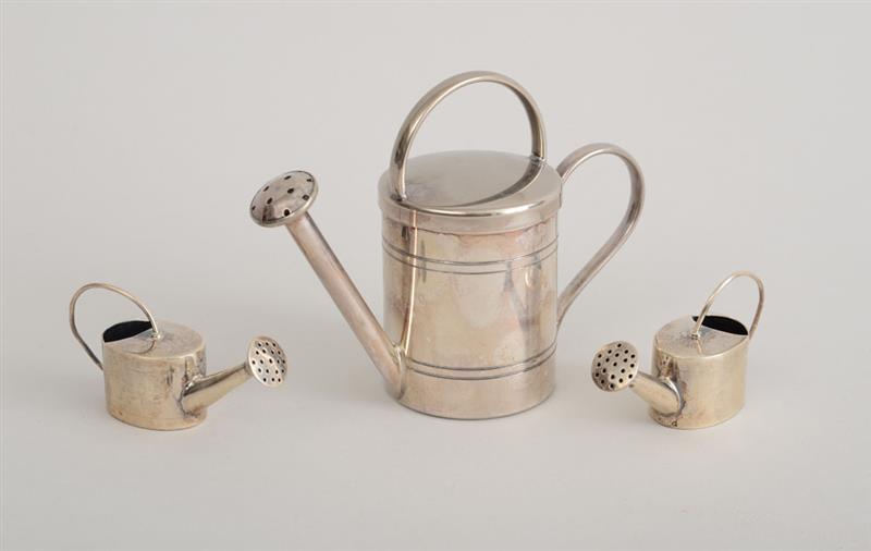 Appraisal: PAIR OF MEXICAN SILVER MINIATURE WATERING CANS AND A SCENTED