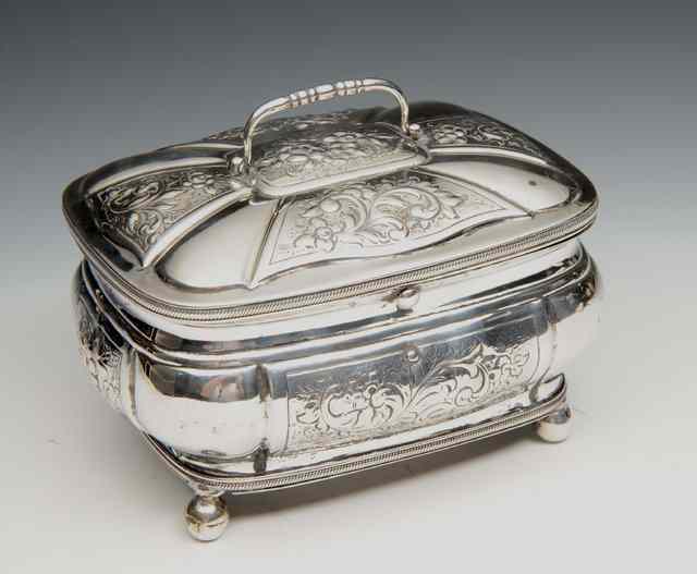 Appraisal: AN ANTIQUE CONTINENTAL WHITE METAL TABLE TOP CASKET the lid