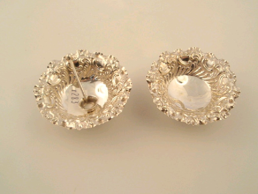 Appraisal: A pair of late Victorian silver salts with crimped and