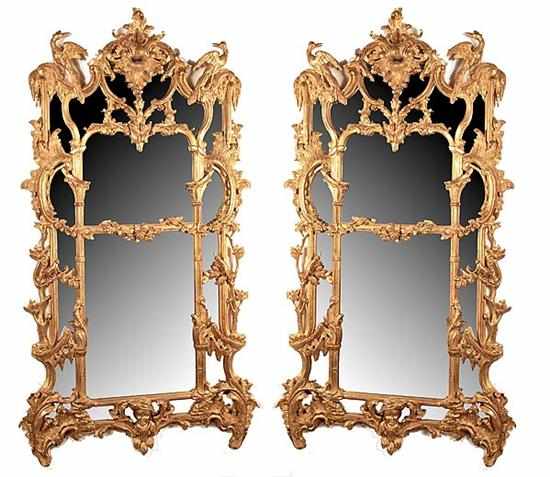 Appraisal: Pair Rococo style carved giltwood mirrors early th century acanthus