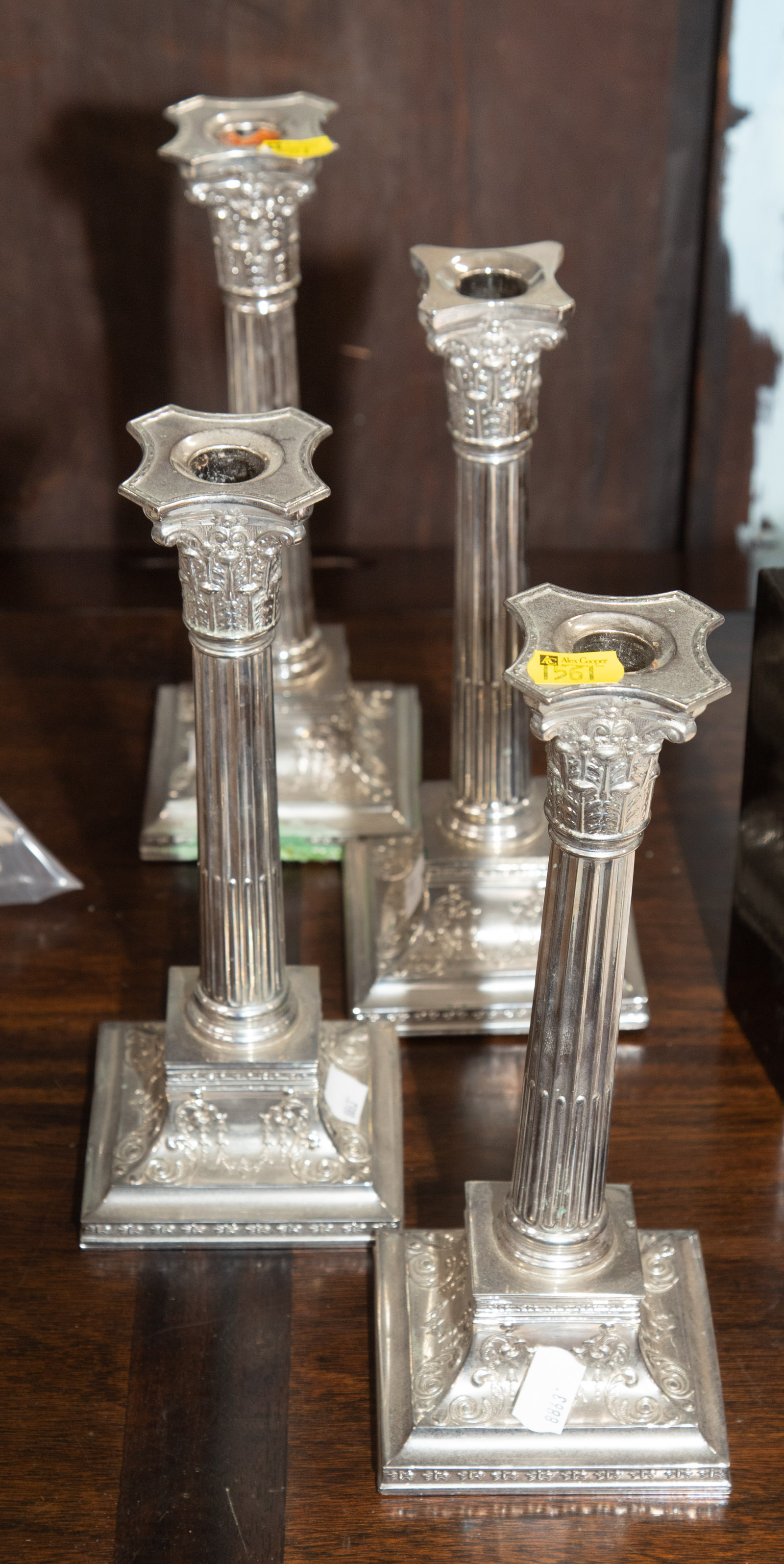 Appraisal: A SET OF FOUR WILCOX SILVER PLATED CANDLESTICKS st quarter