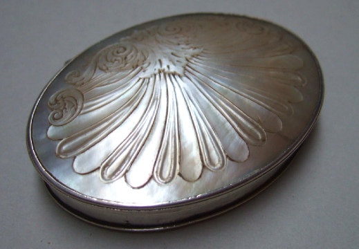 Appraisal: A Britannia standard silver mounted mother of pearl oval hinge