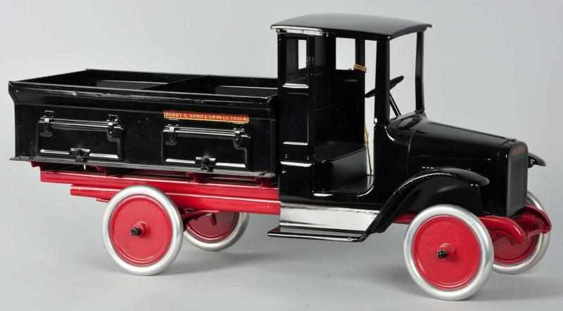 Appraisal: Pressed Steel Buddy L Sand Gravel Truck Toy Description American