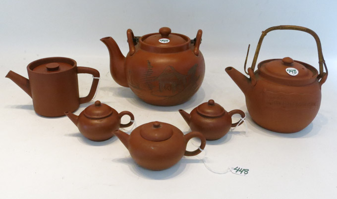 Appraisal: SIX POTTERY TEAPOTS in various patterns including Chinese Japanese and