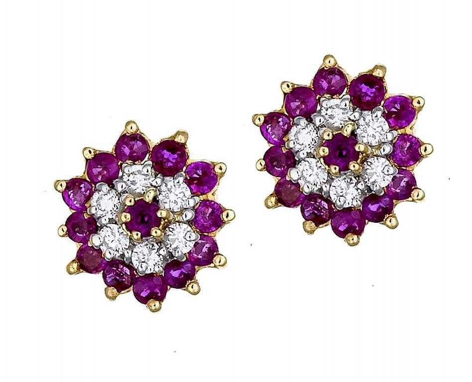 Appraisal: A PAIR OF RUBY AND DIAMOND CLUSTER EARRINGS in ct