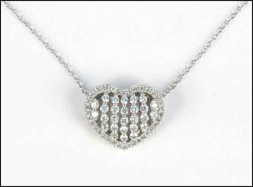 Appraisal: DIAMOND AND KARAT WHITE GOLD HEART NECKLACE round diamonds are