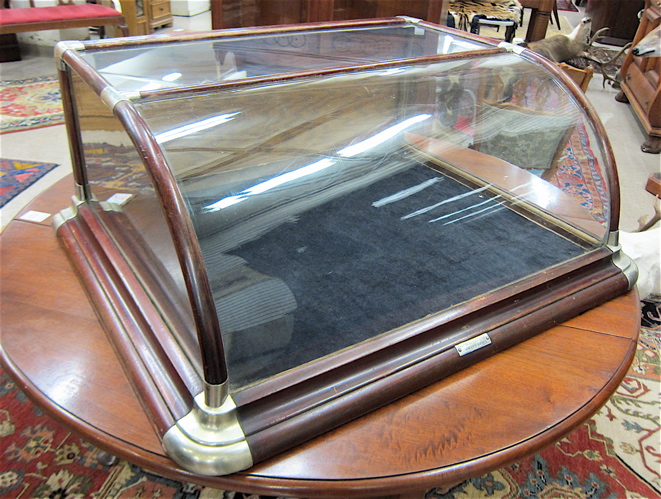 Appraisal: A GLASS AND MAHOGANY COUNTER-TOP SHOWCASE Paxton Gallagher Co William