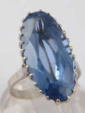 Appraisal: A white metal tests carat gold blue topaz ring topaz