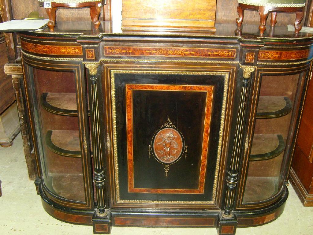 Appraisal: A mid Victorian D-end credenza the ebonised panels with amboyna