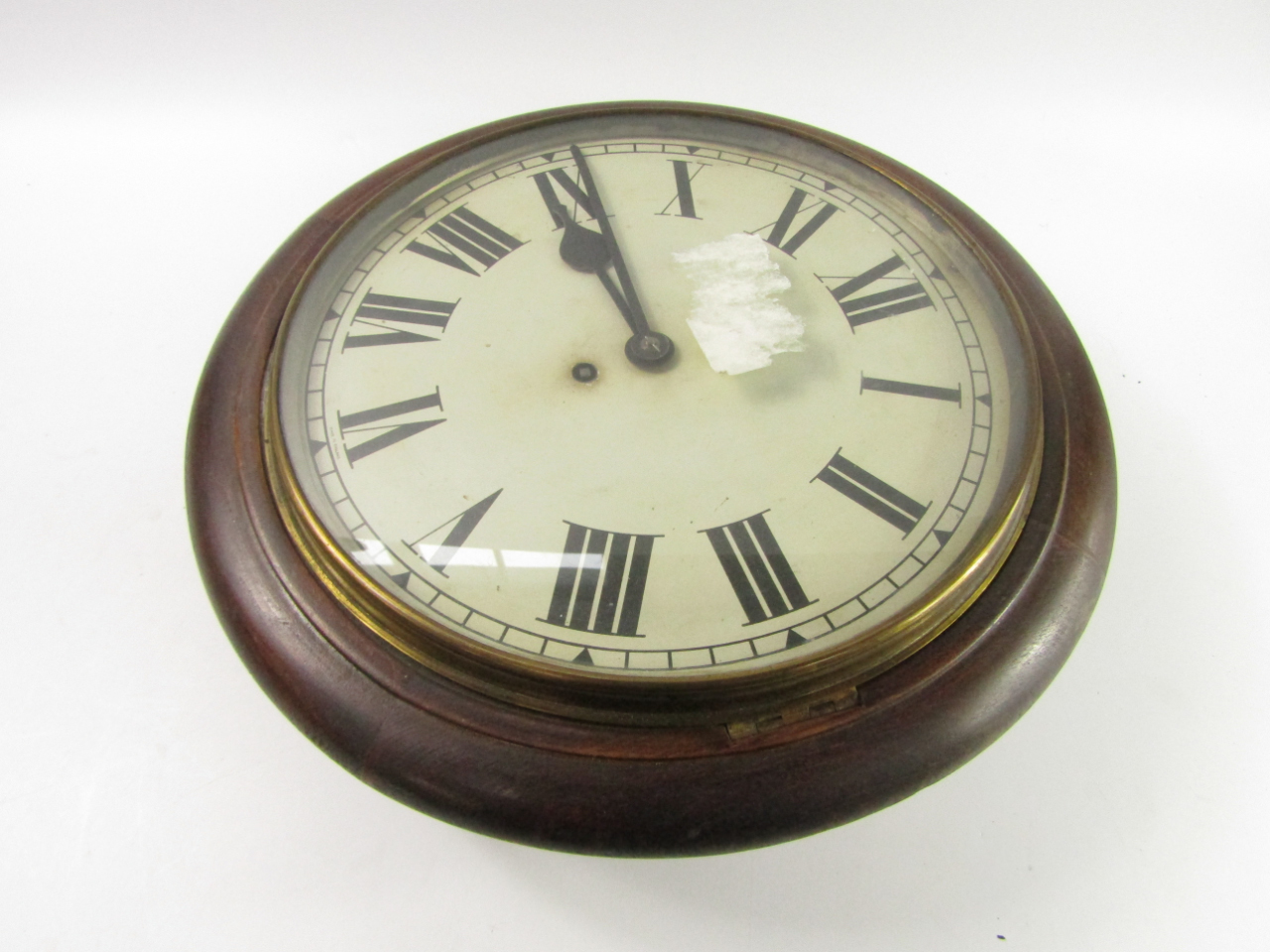 Appraisal: An oak cased early thC circular wall clock dial bearing