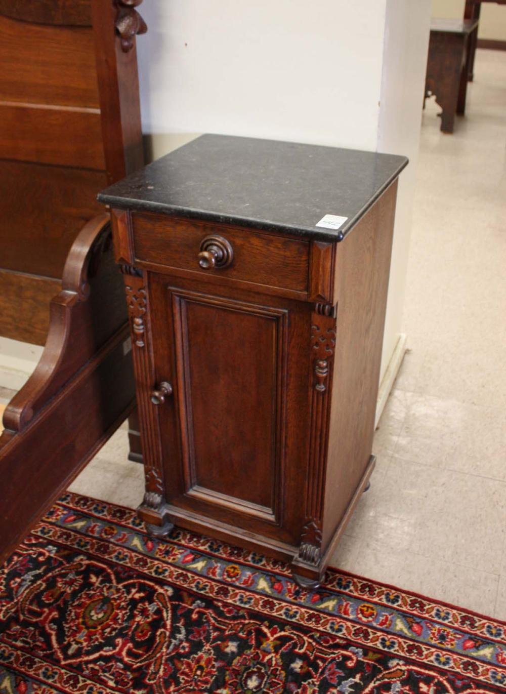 Appraisal: AN OAK MARBLE-TOP CABINET NIGHTSTAND German late th century H