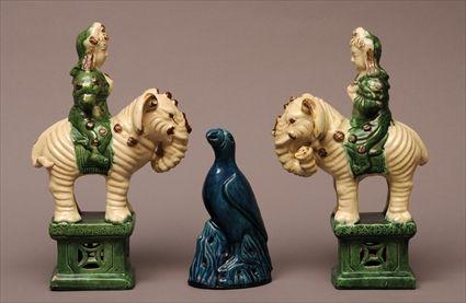 Appraisal: PAIR OF CHINESE TANG-STYLE GLAZED POTTERY FIGURES OF WARRIORS MOUNTED