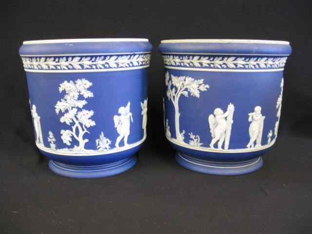 Appraisal: Pair of Wedgwood Dark Blue JasperwareJardinieres unusual cherub band fine