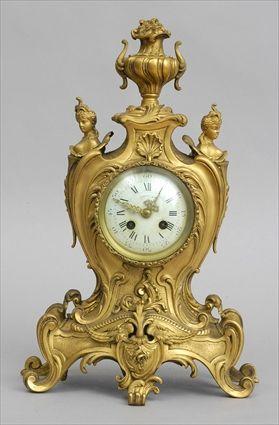 Appraisal: FRENCH LOUIS XV-STYLE GILT-METAL MANTEL CLOCK Retailed by Tiffany Co