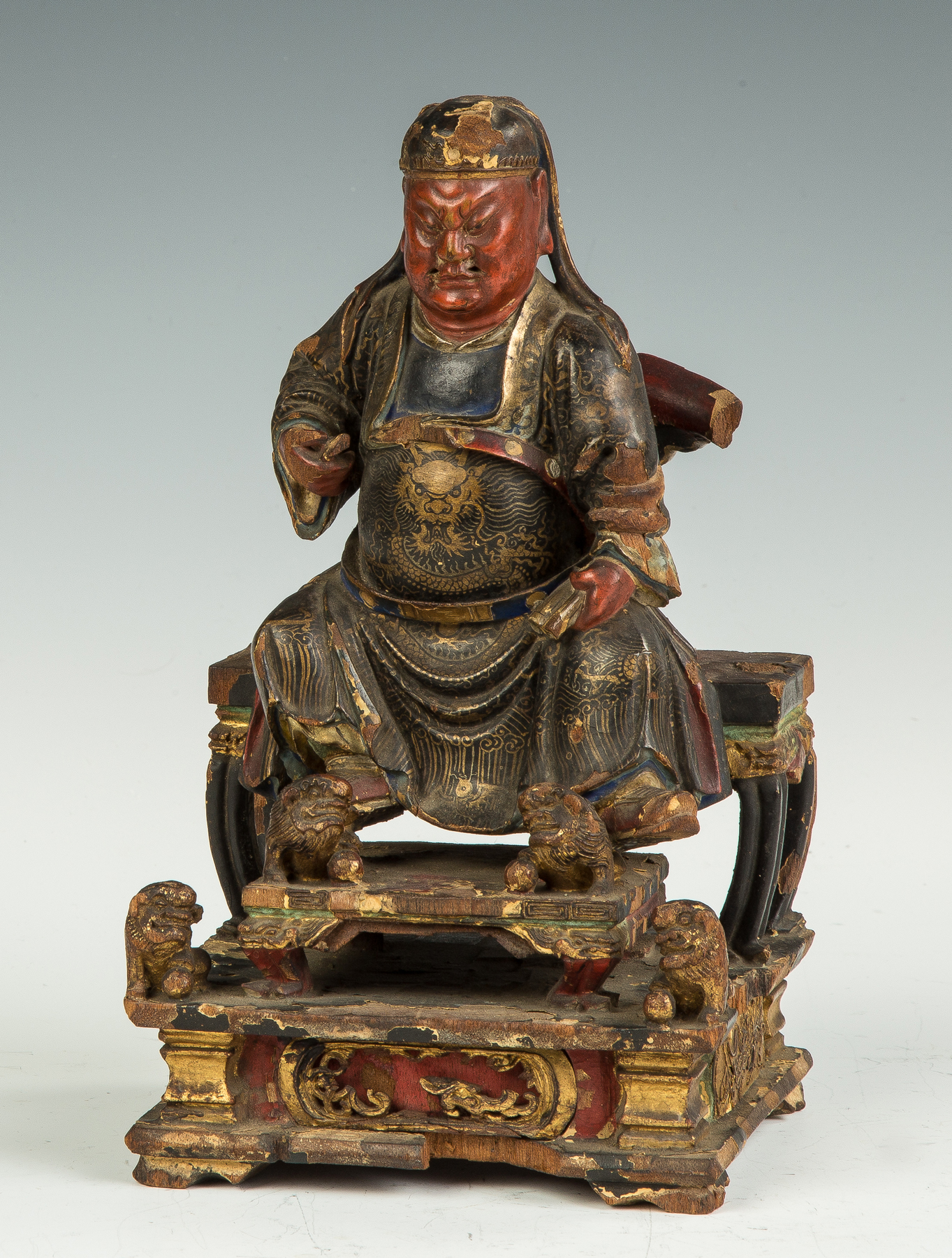 Appraisal: Early Chinese Figure of a Guardian of Buddhism Carved wood