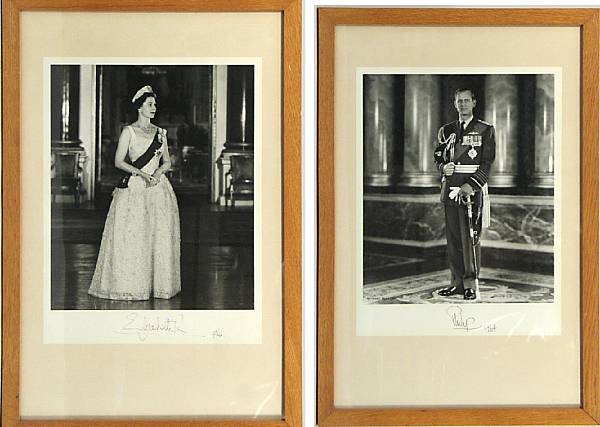 Appraisal: ROYALTY-PHOTOGRAPHS A pair of photos of Queen Elizabeth and Prince