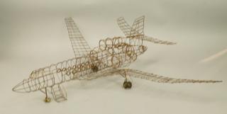 Appraisal: Metal Wire Figural Plane Sculpture Welded wire f Metal Wire