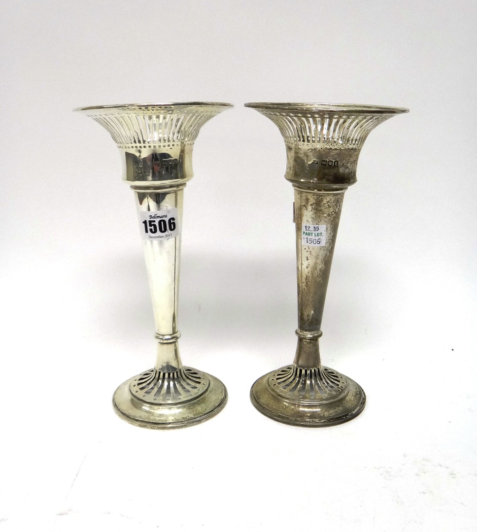 Appraisal: Two similar silver trumpet shaped vases each decorated with a