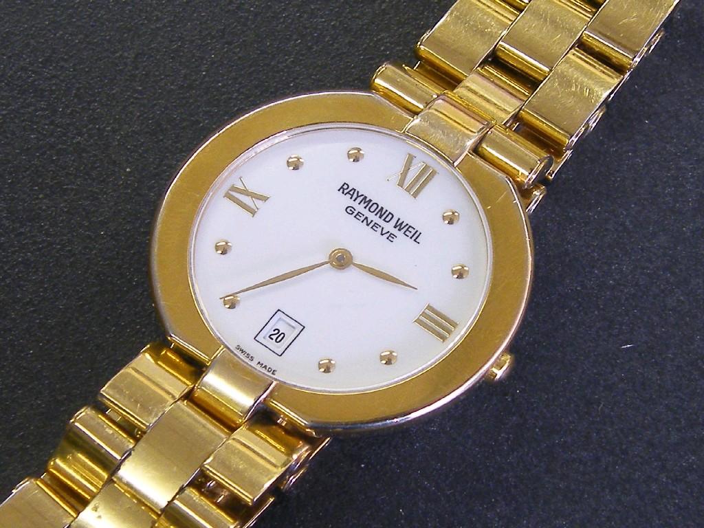 Appraisal: Raymond Weil Geneva gold plated gentleman's bracelet watch reference quartz