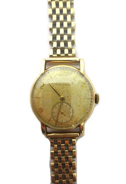 Appraisal: A gentleman's ct gold circular cased Longines wristwatch with a