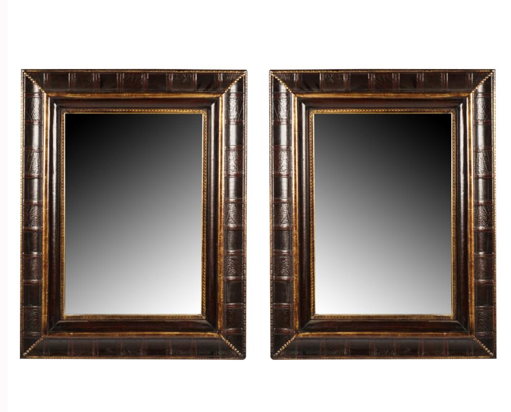 Appraisal: PAIR OF PORTUGUESE STYLE EMBOSSED LEATHER MIRRORSmodern each x inches