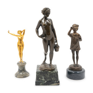 Appraisal: Three Continental Bronze Figures TH CENTURY the nude female with