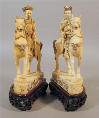 Appraisal: Fine pair of Chinese elephant ivory figures Well carved male