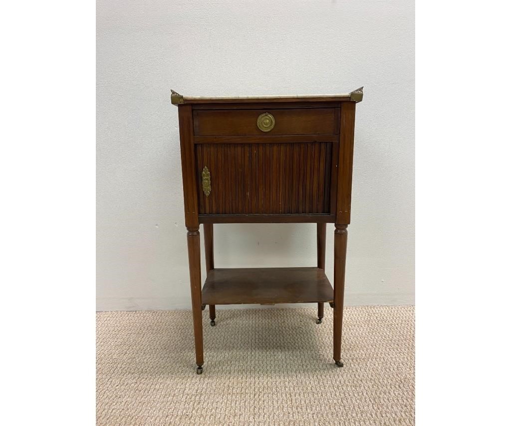 Appraisal: French marble top walnut tambour front desk with brass galleried