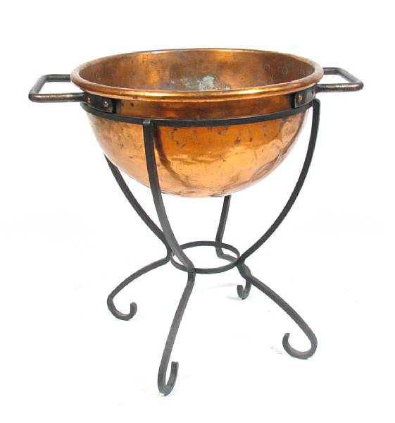 Appraisal: A copper basin on wrought iron stand height in width