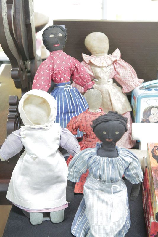 Appraisal: FIVE FOLKSY CLOTH DOLLS Two black African American stockinette dolls