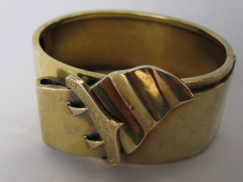 Appraisal: A Victorian Gold hinged Bangle of buckle and belt motif