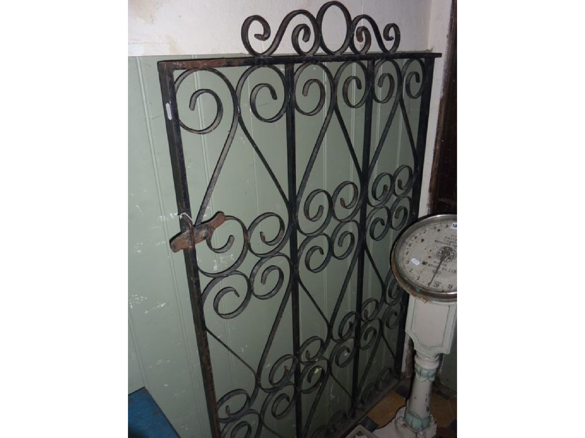 Appraisal: A decorative ironwork pedestrian gate cm wide