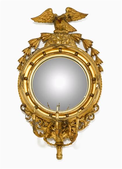 Appraisal: Classical carved mahogany girandole mirror circa The circular convex mirrored