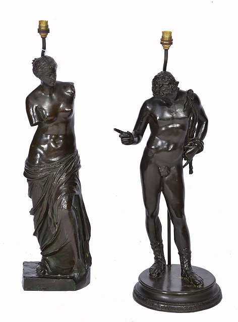 Appraisal: A PAIR OF BRONZE LAMPS of figural form after the