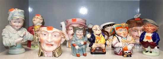 Appraisal: assorted china and porcelain character jugs similar teapot and tobacco