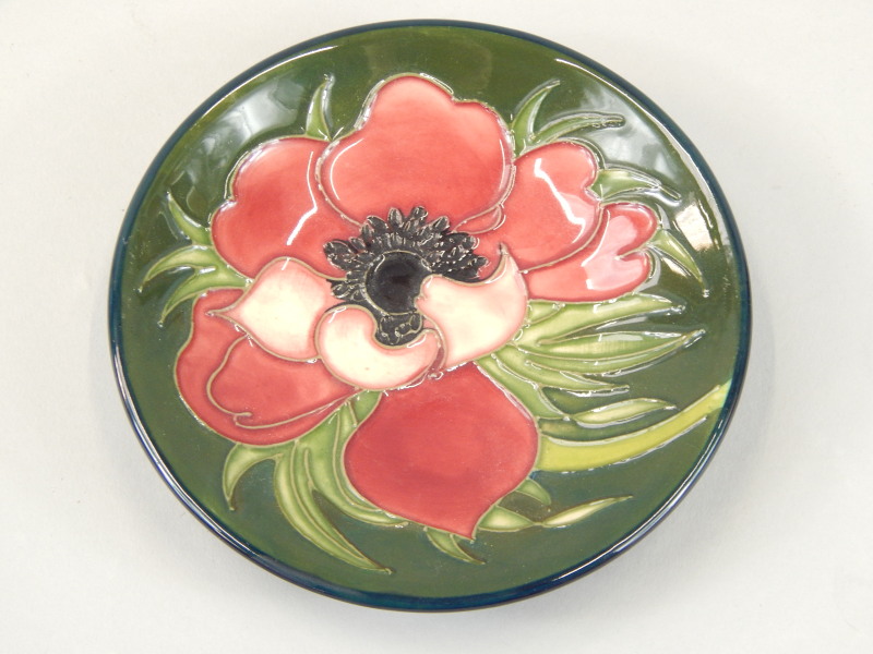 Appraisal: A modern Moorcroft pin tray decorated with a flower to