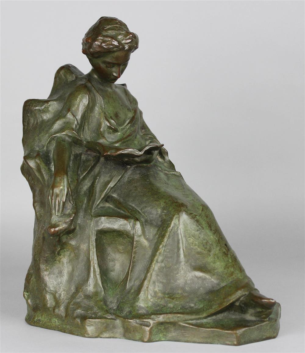 Appraisal: AN ART NOUVEAU BRONZE FIGURE OF A LADY READING BY