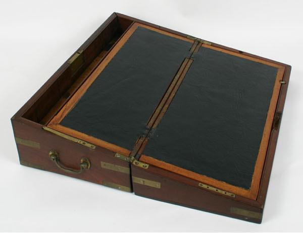 Appraisal: Mahogany lap desk with hinged slant lid leather writing surface