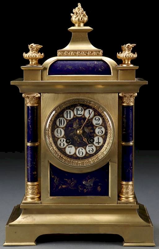 Appraisal: A FRENCH GILT BRONZE AND PORCELAIN MANTLE CLOCK A FRENCH