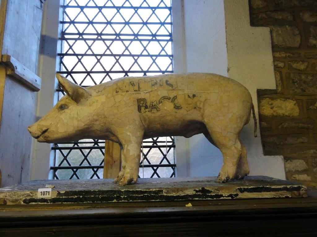 Appraisal: An old shop advertising model of a pig with remains