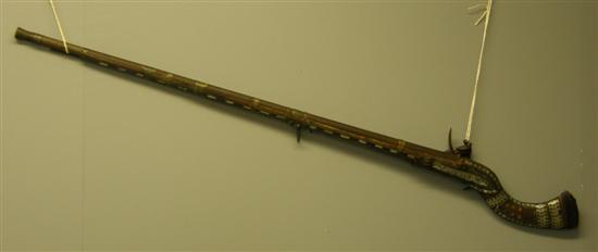 Appraisal: th century Eastern rifle with mother of pearl inlay length