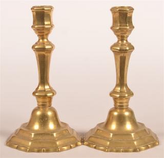 Appraisal: Pair of th Century Brass Candlesticks Paneled standards with stepped